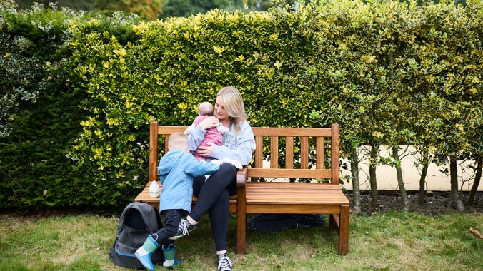 Visitors on a bench in the Union Jack Gardens